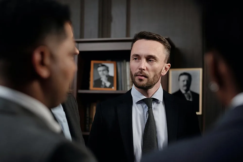 Two men talking in an office